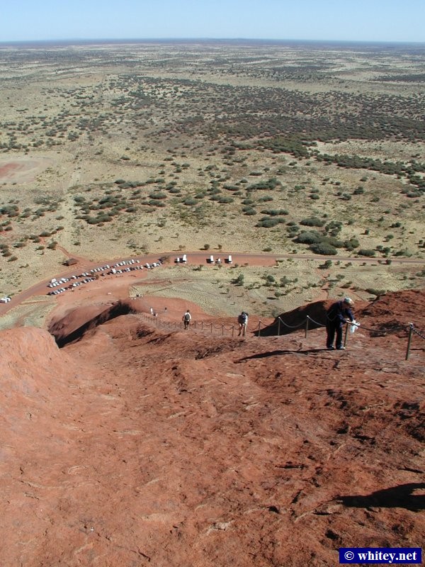 Climbing Uluru (Ayres Rock), Australia. This photo shows the height, steepness, and danger of the climb. The curvature of the earth is visible from up there!