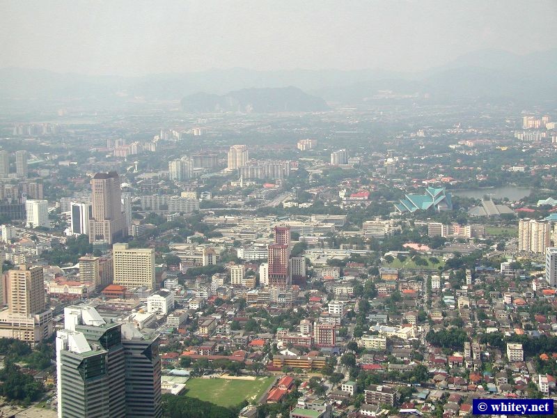 View from Менара Куала-Лумпур towards the Batu Caves, Куала-Лумпур, Малайзия.